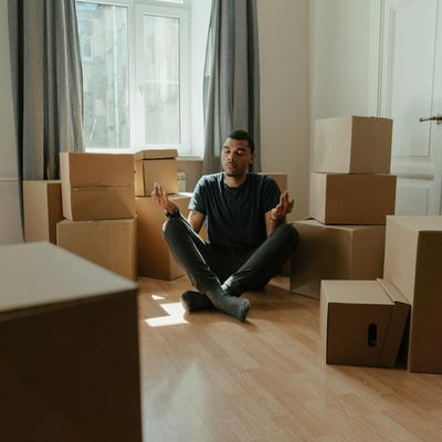 A stack of yoga blocks and a strap.